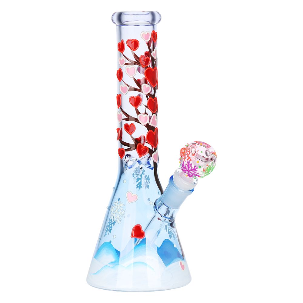 Light Blue Glass Bong device with heart designs on a white background