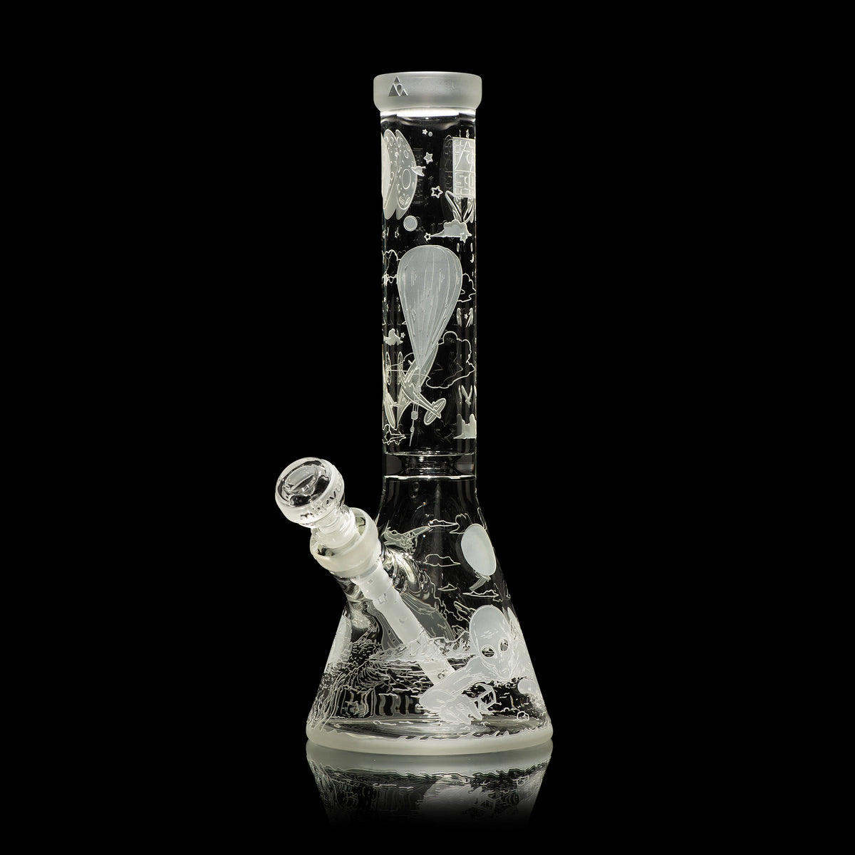 Glass water pipe with black and white abstract design on a black background