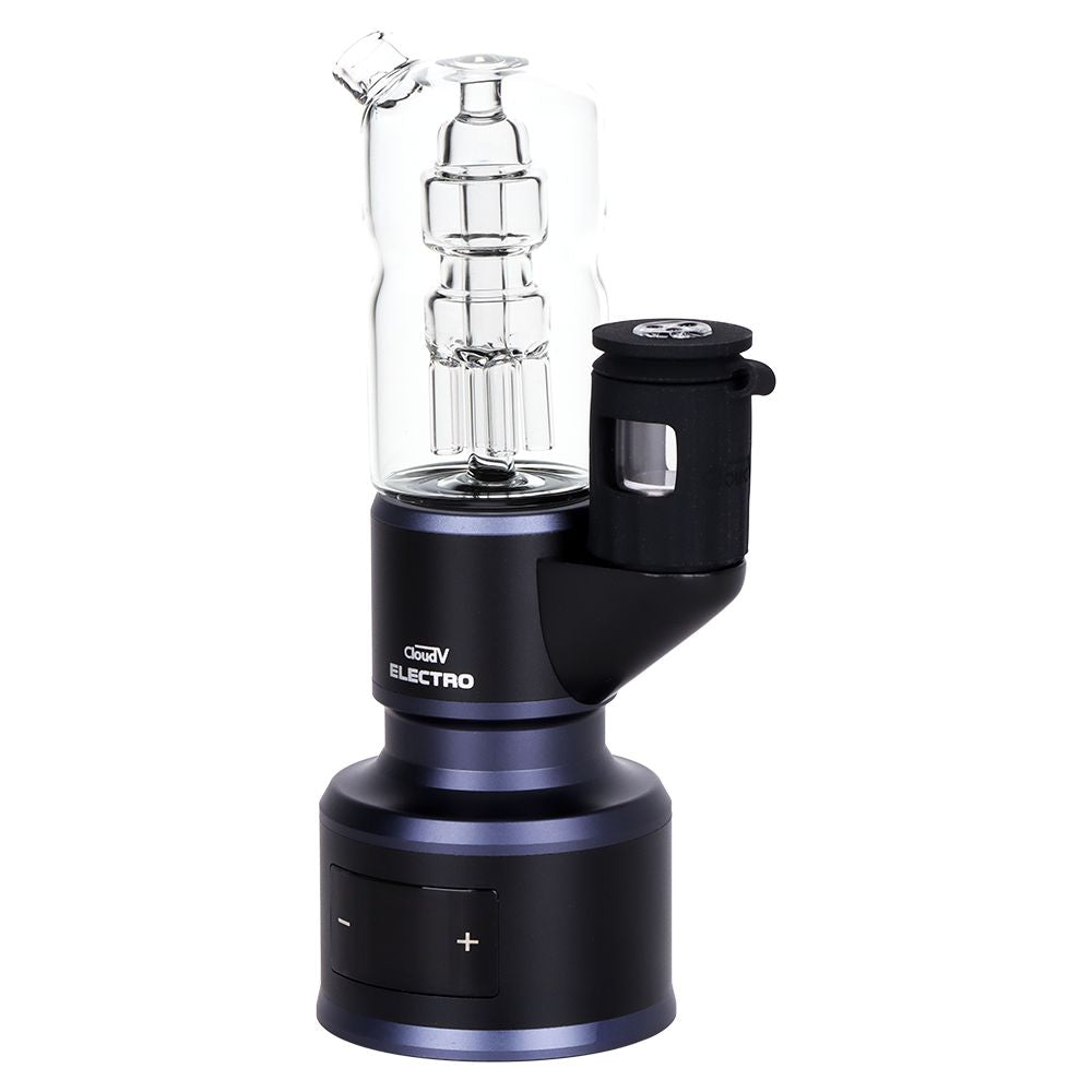 A 360-degree rotating glass and metal electric dab rig on a solid white background. The device features a dark metallic blue and black base with a clear glass chamber containing a multi-tiered metal filter.