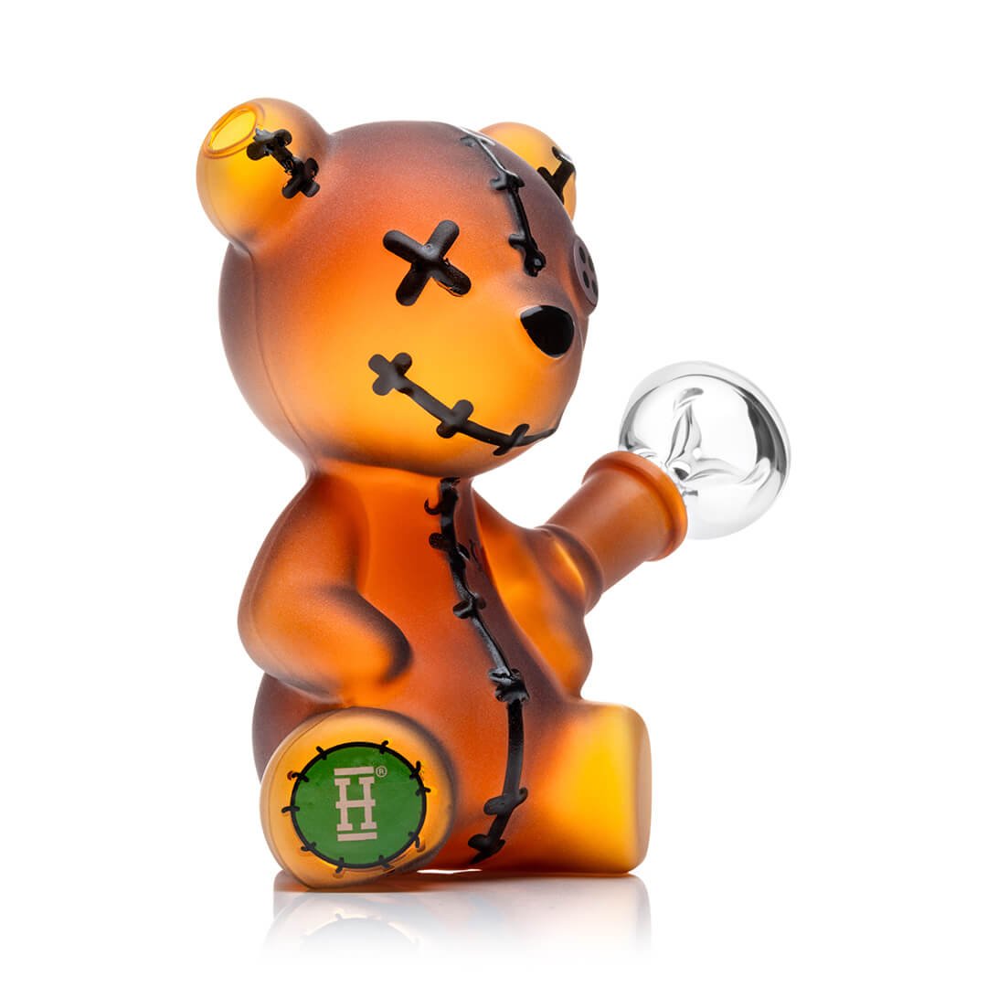 Orange teddy bear figure Glass Mini Bong on a white background