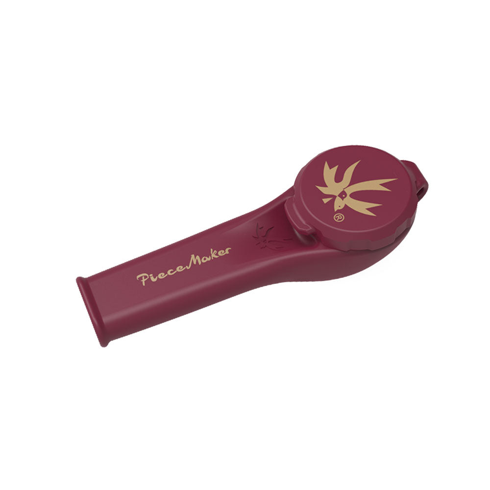 Red silicone hand pipe with gold logo and text on a white background