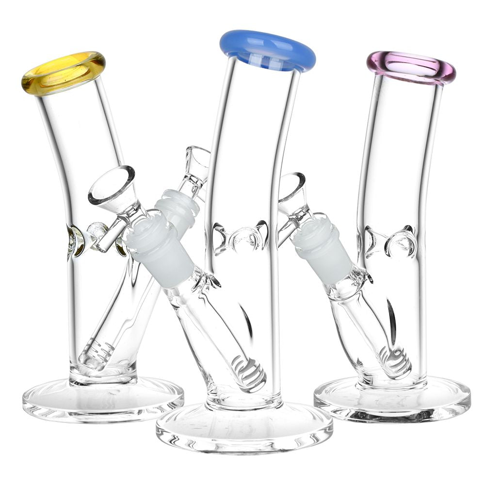 Three glass bongs with colored tops on a white background
