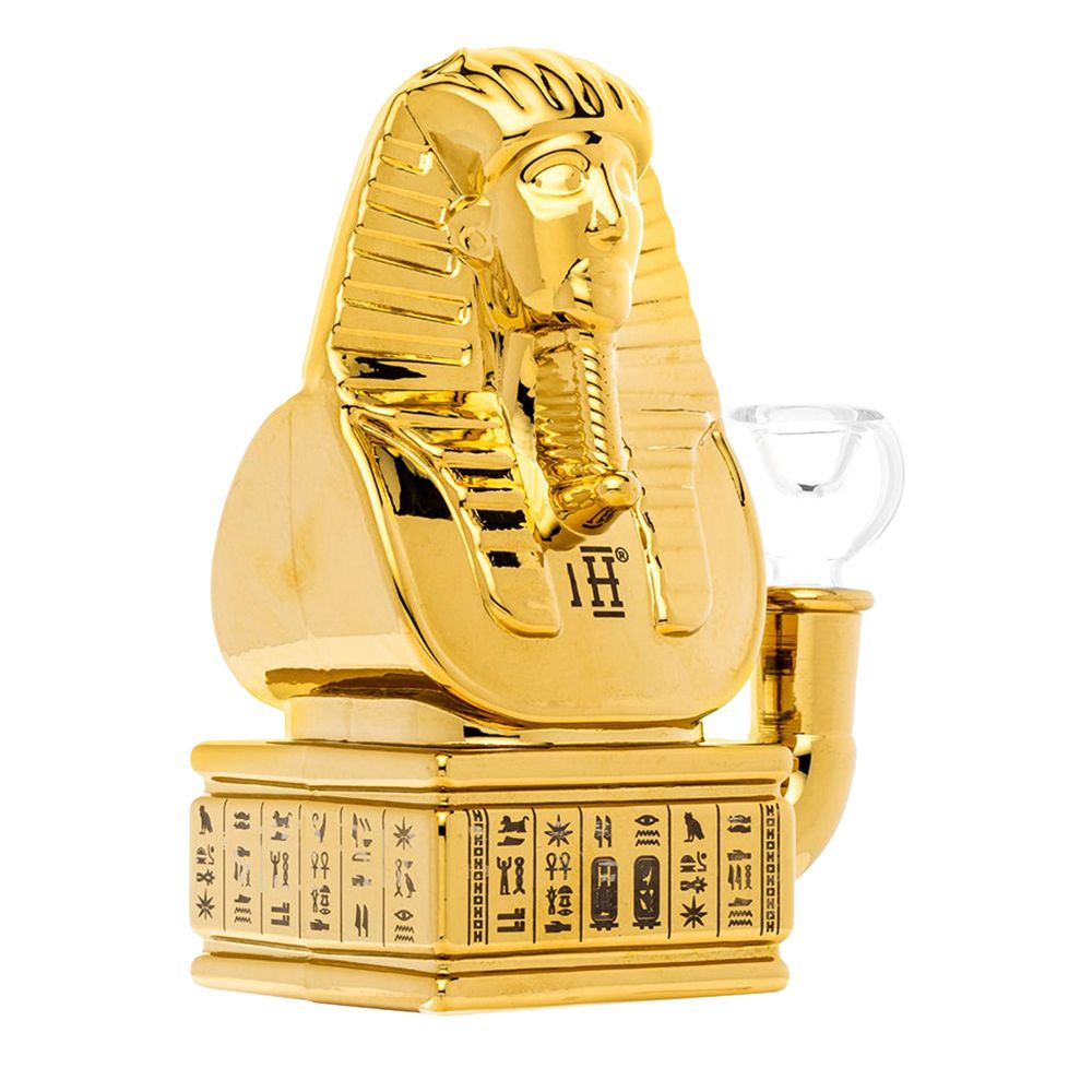 Gold sphinx-shaped Glass Bong on a white background