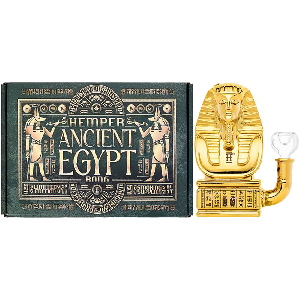 Gold sphinx-shaped bong with 'Hemper Ancient Egypt' packaging on a white background