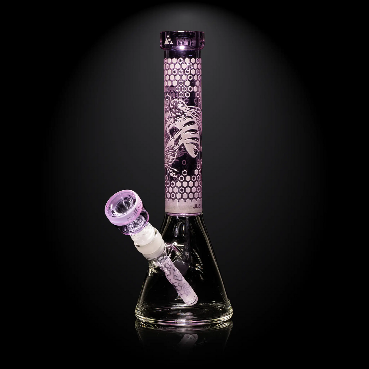 Glass bong with purple accents on a black background