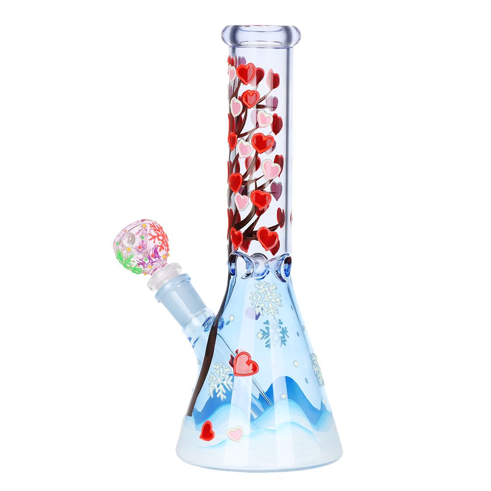 Glass water pipe with heart and snow design on a white background