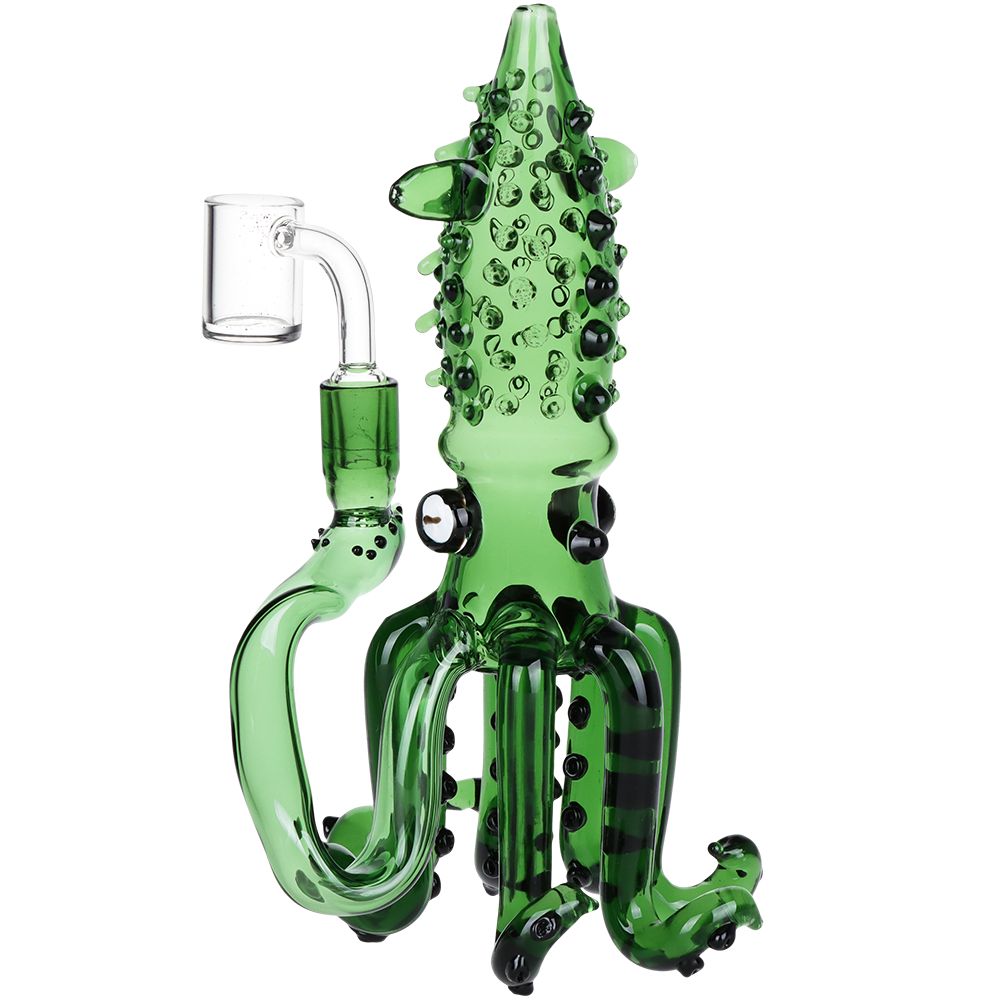 Green glass squid-shaped smoking accessory for Dab and Wax on a white background
