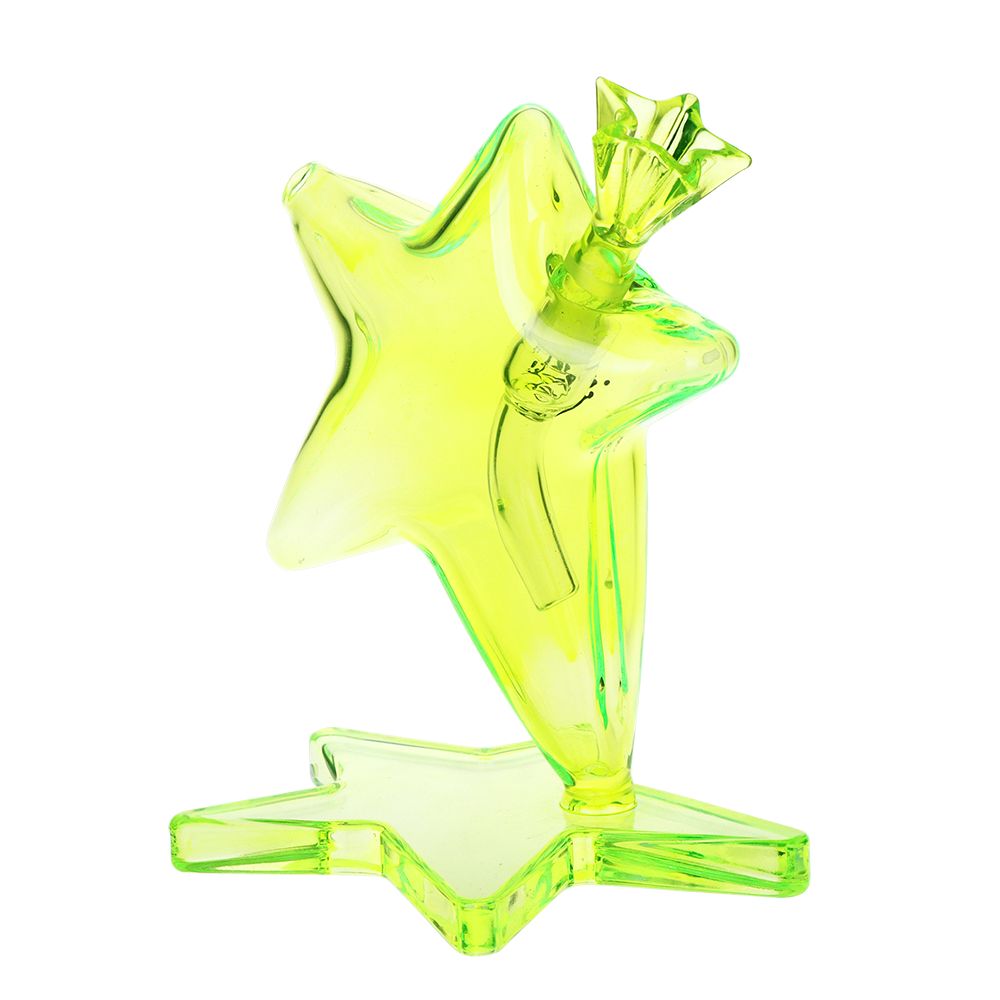 Green star-shaped glass water pipe on a white background