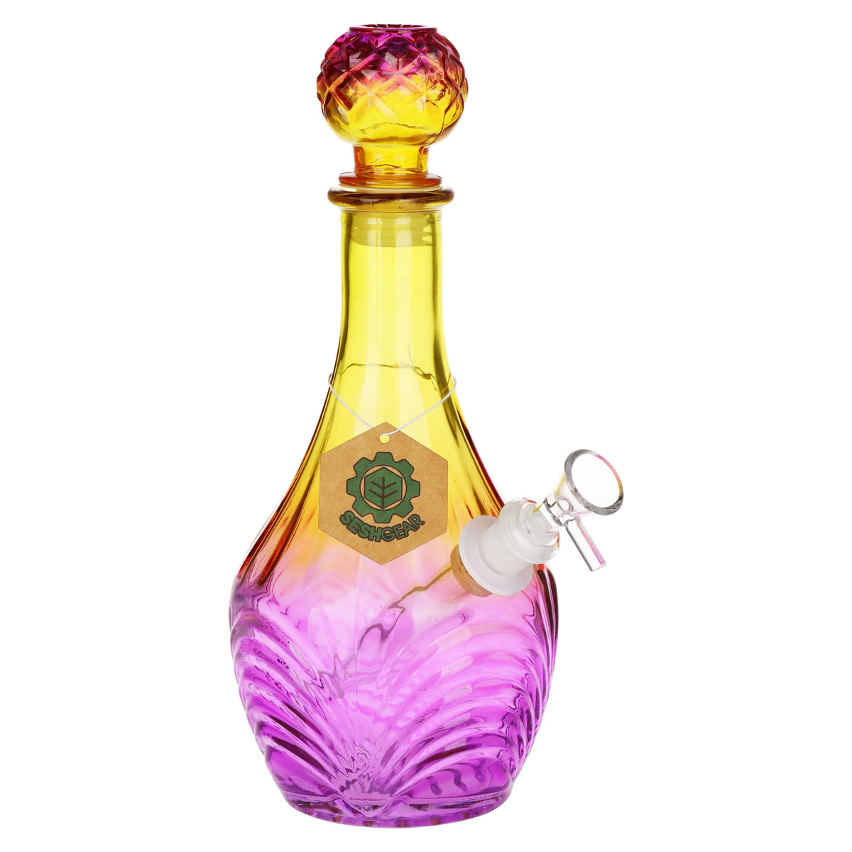 Colorful glass decanter with a yellow and pink top on a white background