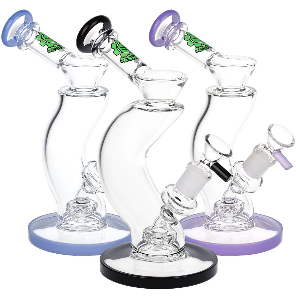Set of glass water bongs with colorful lids on a white background