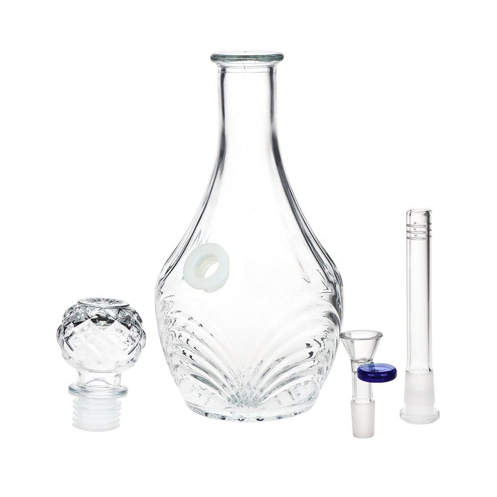 Clear glass decanter bong with various components on a white background