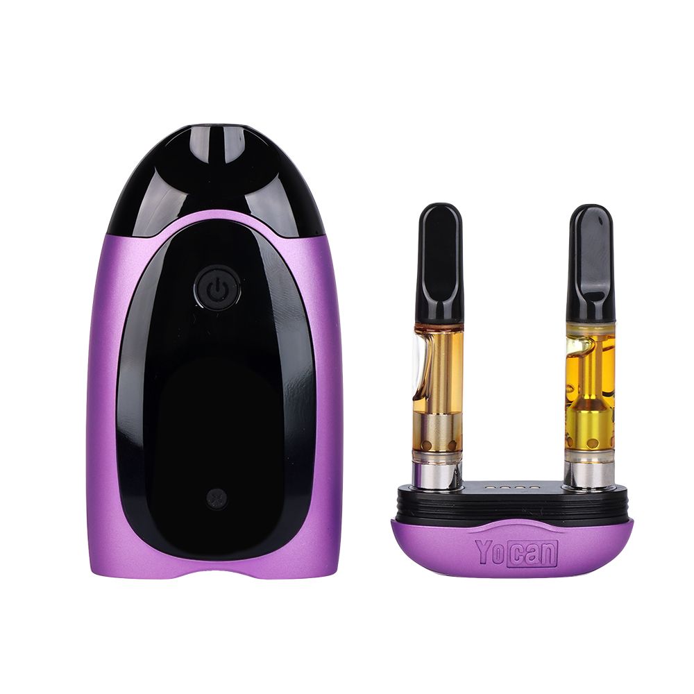 Purple and black vape device with two cartridges on a white background